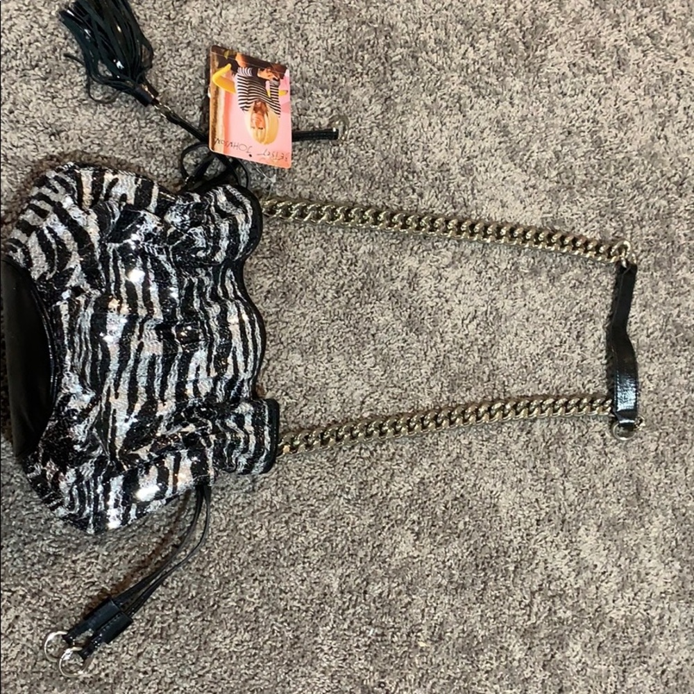 Betsey Johnson small drawstring tiger crossbody